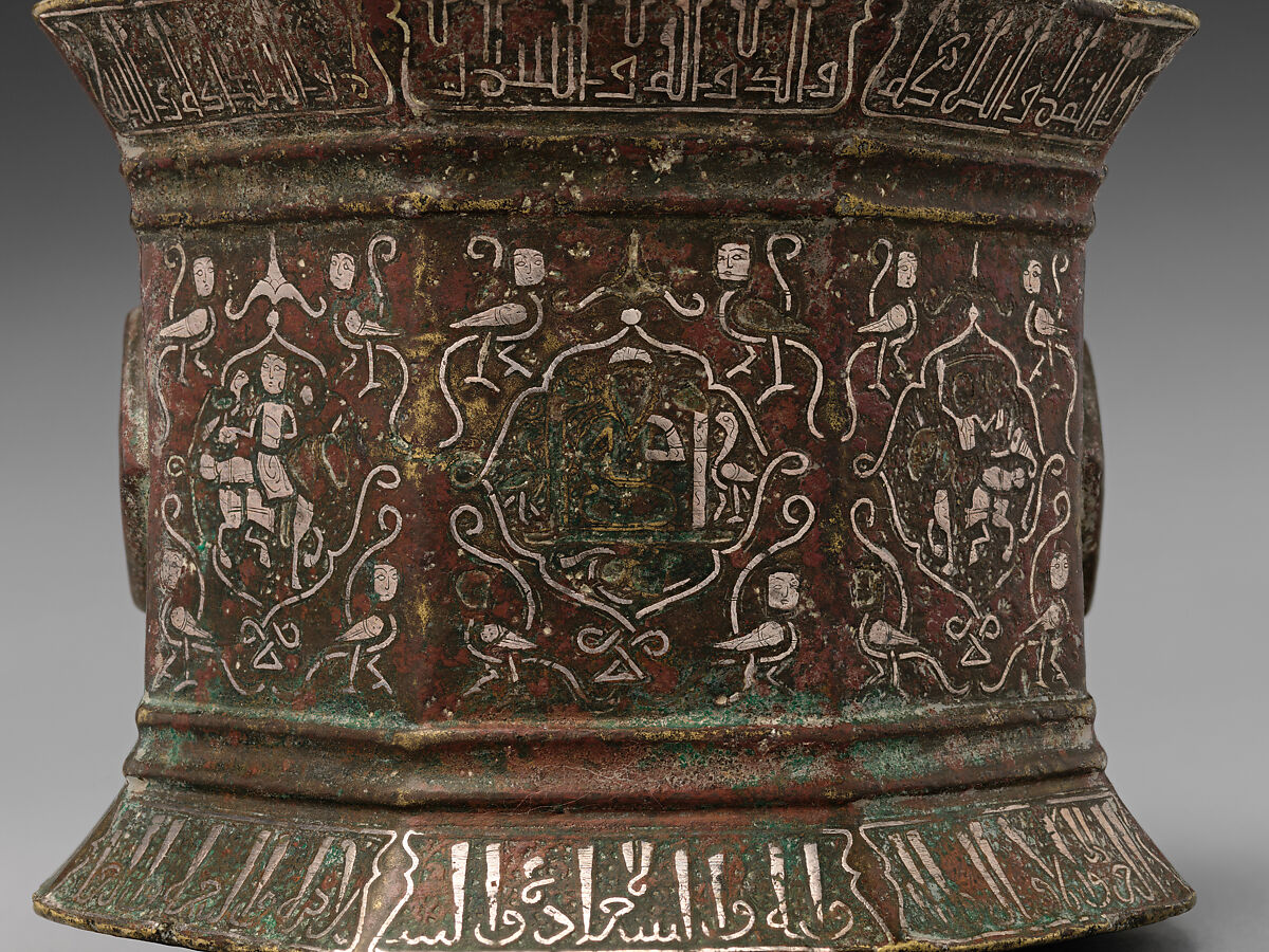 Mortar and Pestle made for Abu Bakr 'Ali Malikzad al-Tabrizi, Bronze; inlaid with silver and black compound