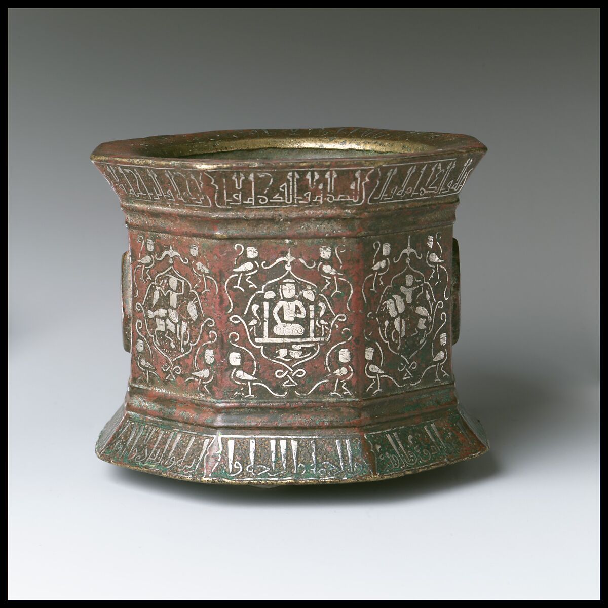 Mortar and Pestle made for Abu Bakr 'Ali Malikzad al-Tabrizi, Bronze; inlaid with silver and black compound