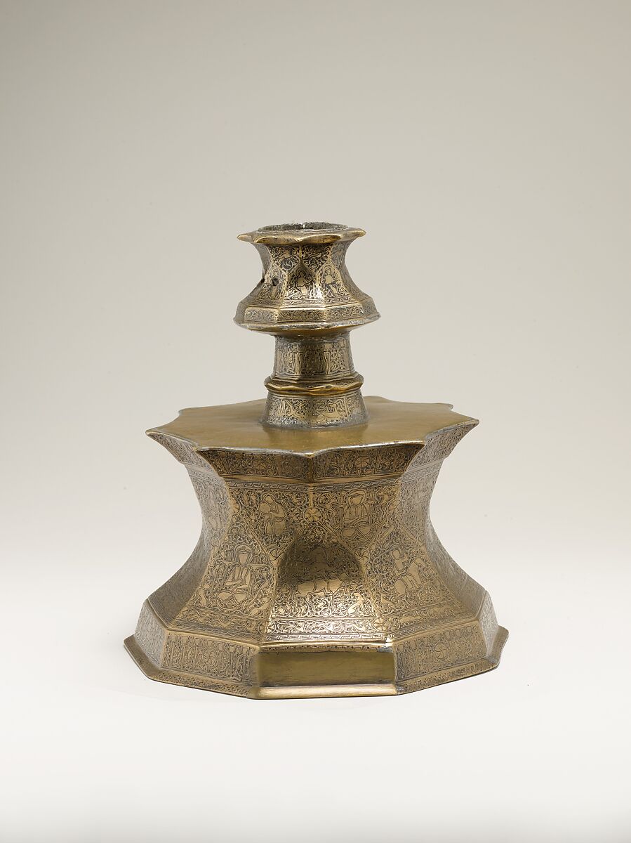 Candlestick with Figural Imagery, Brass; cast, engraved, and inlaid with silver and black compound