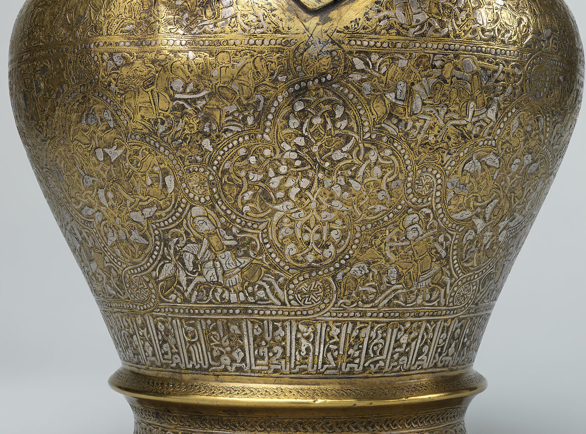 Ewer with Inscription, Horsemen, and Vegetal Decoration, `Umar ibn al-Hajji Jaldak, Brass; inlaid with silver and black compound