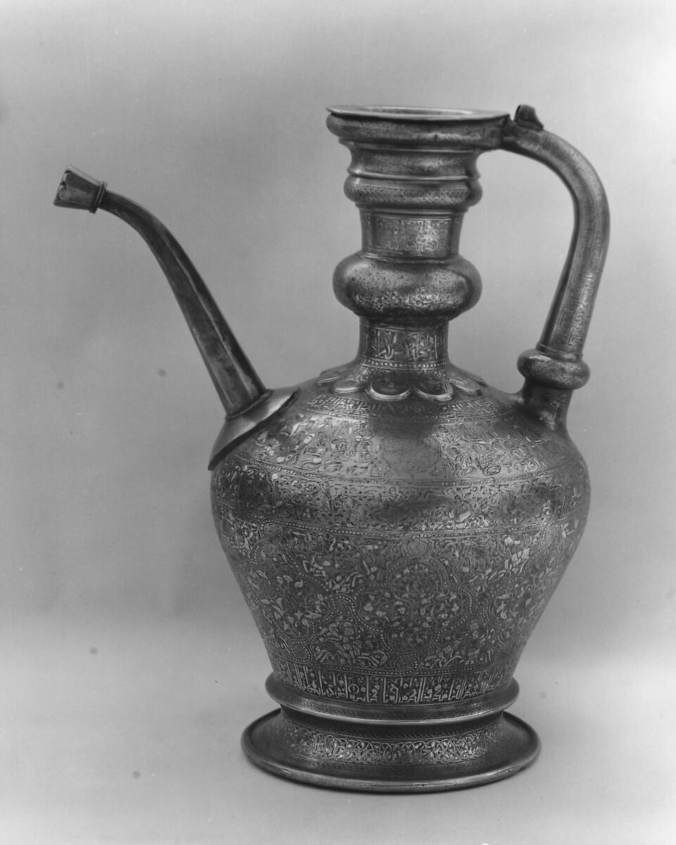 Ewer with Inscription, Horsemen, and Vegetal Decoration, `Umar ibn al-Hajji Jaldak, Brass; inlaid with silver and black compound