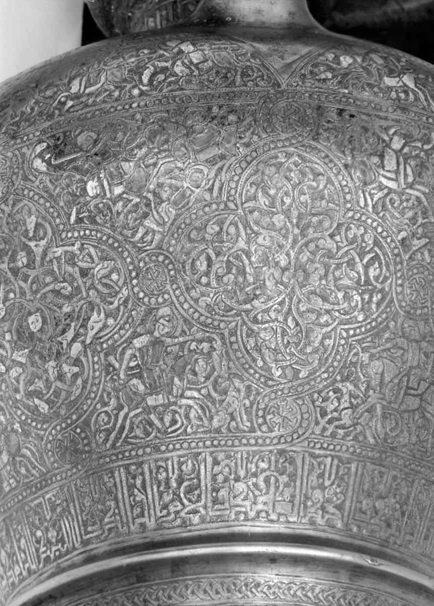 Ewer with Inscription, Horsemen, and Vegetal Decoration, `Umar ibn al-Hajji Jaldak, Brass; inlaid with silver and black compound