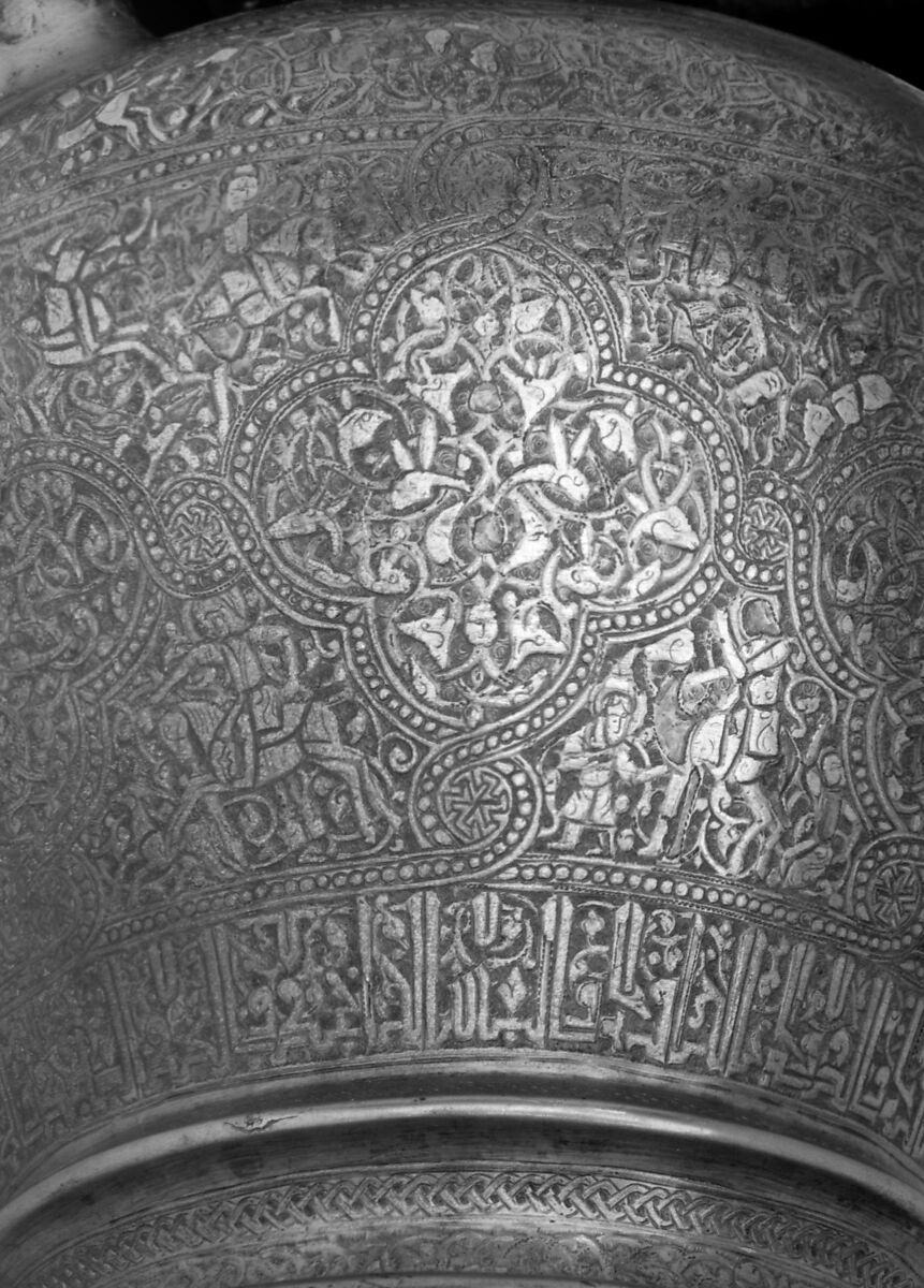 Ewer with Inscription, Horsemen, and Vegetal Decoration, `Umar ibn al-Hajji Jaldak, Brass; inlaid with silver and black compound