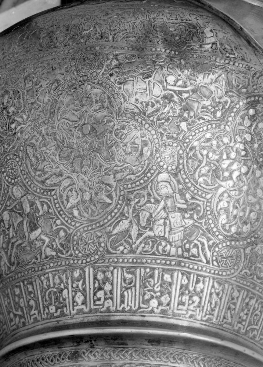 Ewer with Inscription, Horsemen, and Vegetal Decoration, `Umar ibn al-Hajji Jaldak, Brass; inlaid with silver and black compound