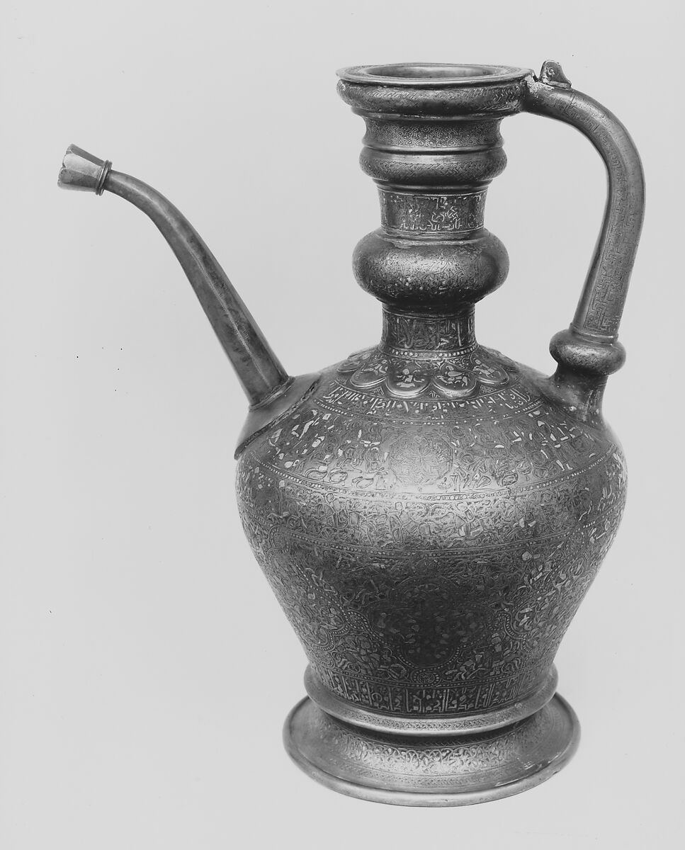 Ewer with Inscription, Horsemen, and Vegetal Decoration, `Umar ibn al-Hajji Jaldak, Brass; inlaid with silver and black compound