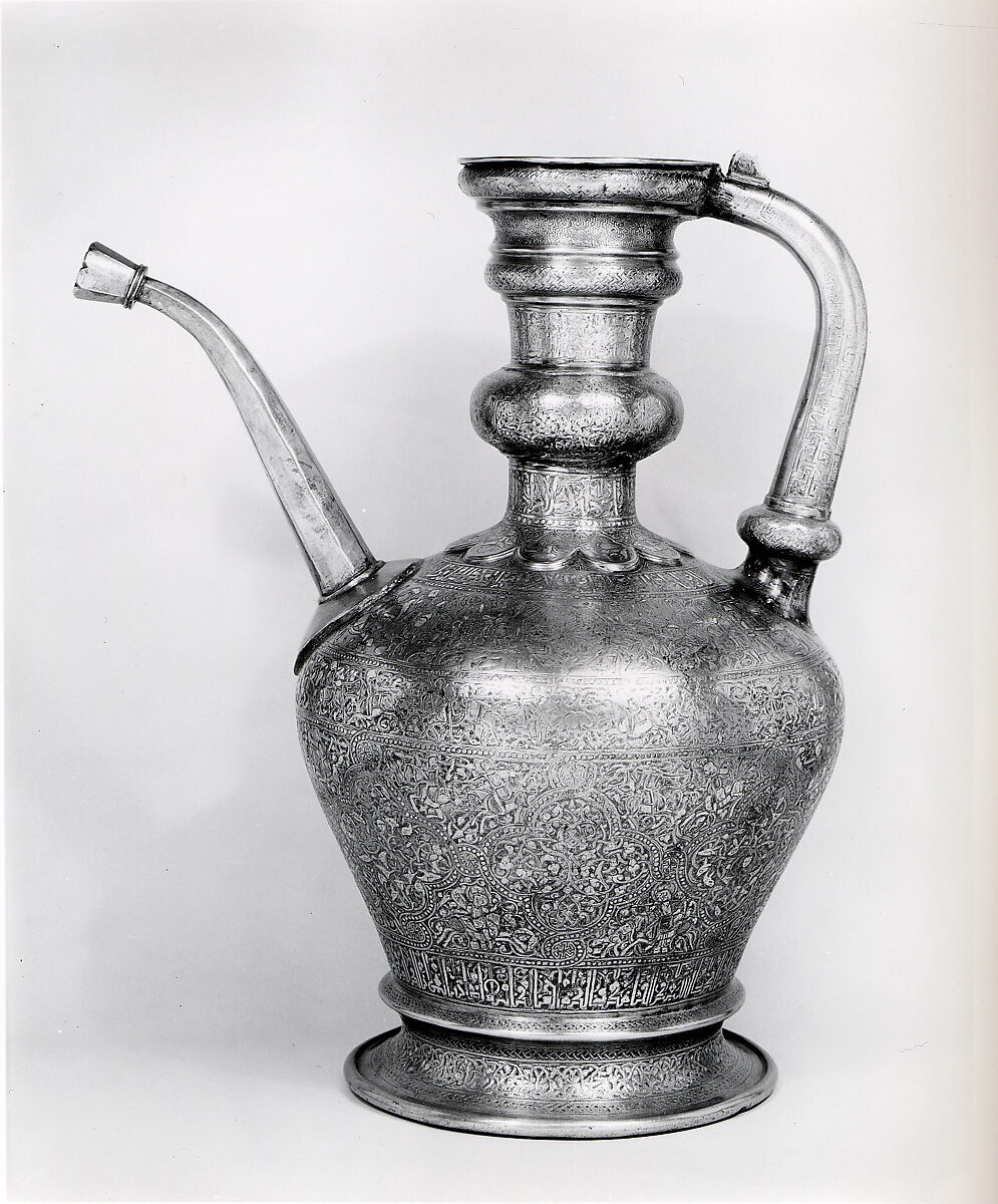 Ewer with Inscription, Horsemen, and Vegetal Decoration, `Umar ibn al-Hajji Jaldak, Brass; inlaid with silver and black compound