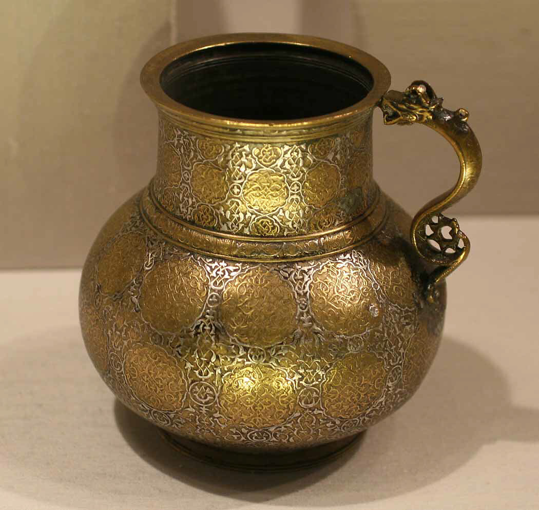 Dragon-Handled Jug with Inscription, Brass; cast and turned, engraved, and inlaid with silver, gold, and black organic compound