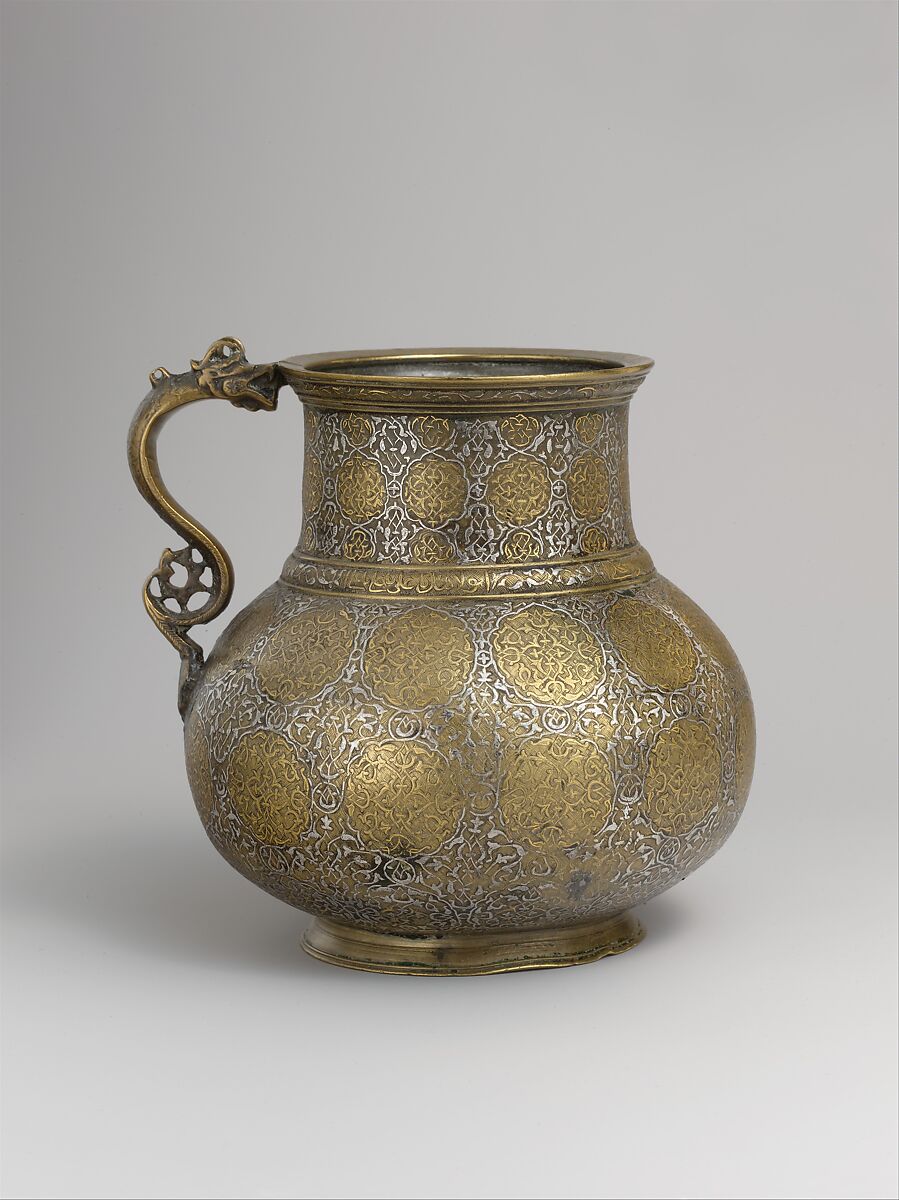 Dragon-Handled Jug with Inscription, Brass; cast and turned, engraved, and inlaid with silver, gold, and black organic compound 