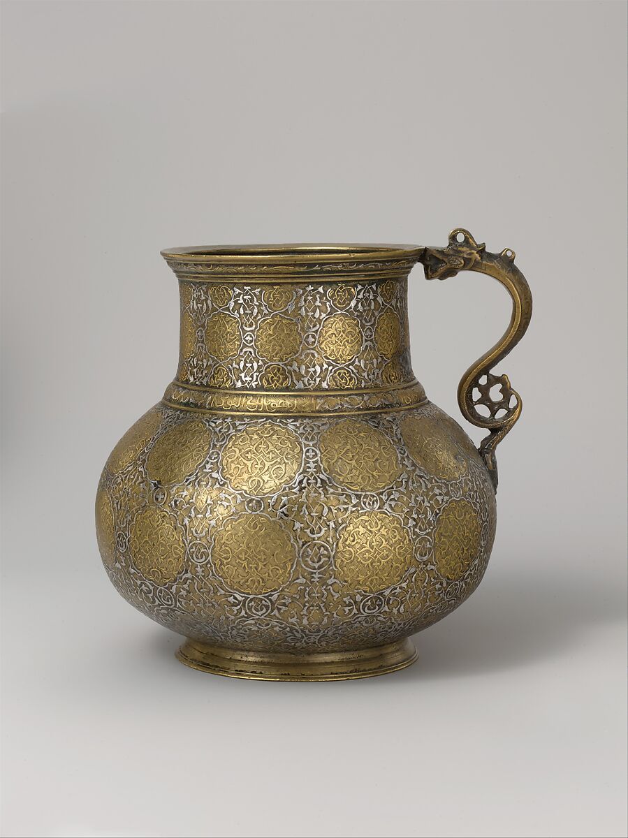 Dragon-Handled Jug with Inscription, Brass; cast and turned, engraved, and inlaid with silver, gold, and black organic compound