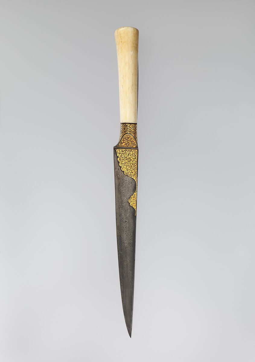 Knife with an Ivory Handle and Qur'anic Inscriptions, Hilt: walrus ivory
Blade: watered steel; gold inlay 