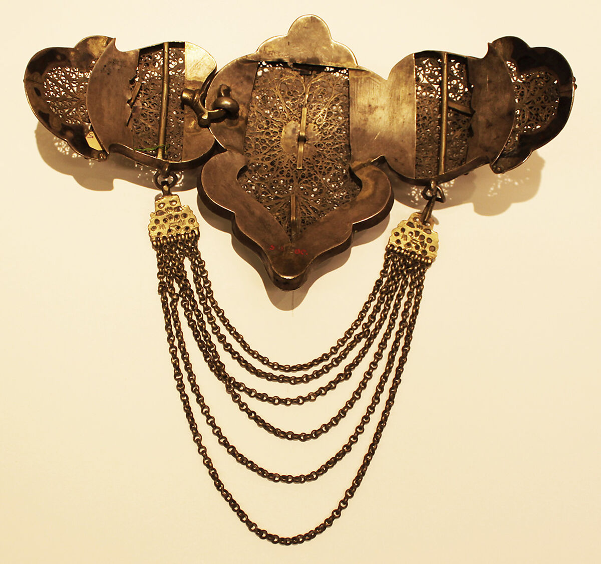 Girdle Clasp, Silver sheet; applied with filigree, granulation, inlaid with enamel