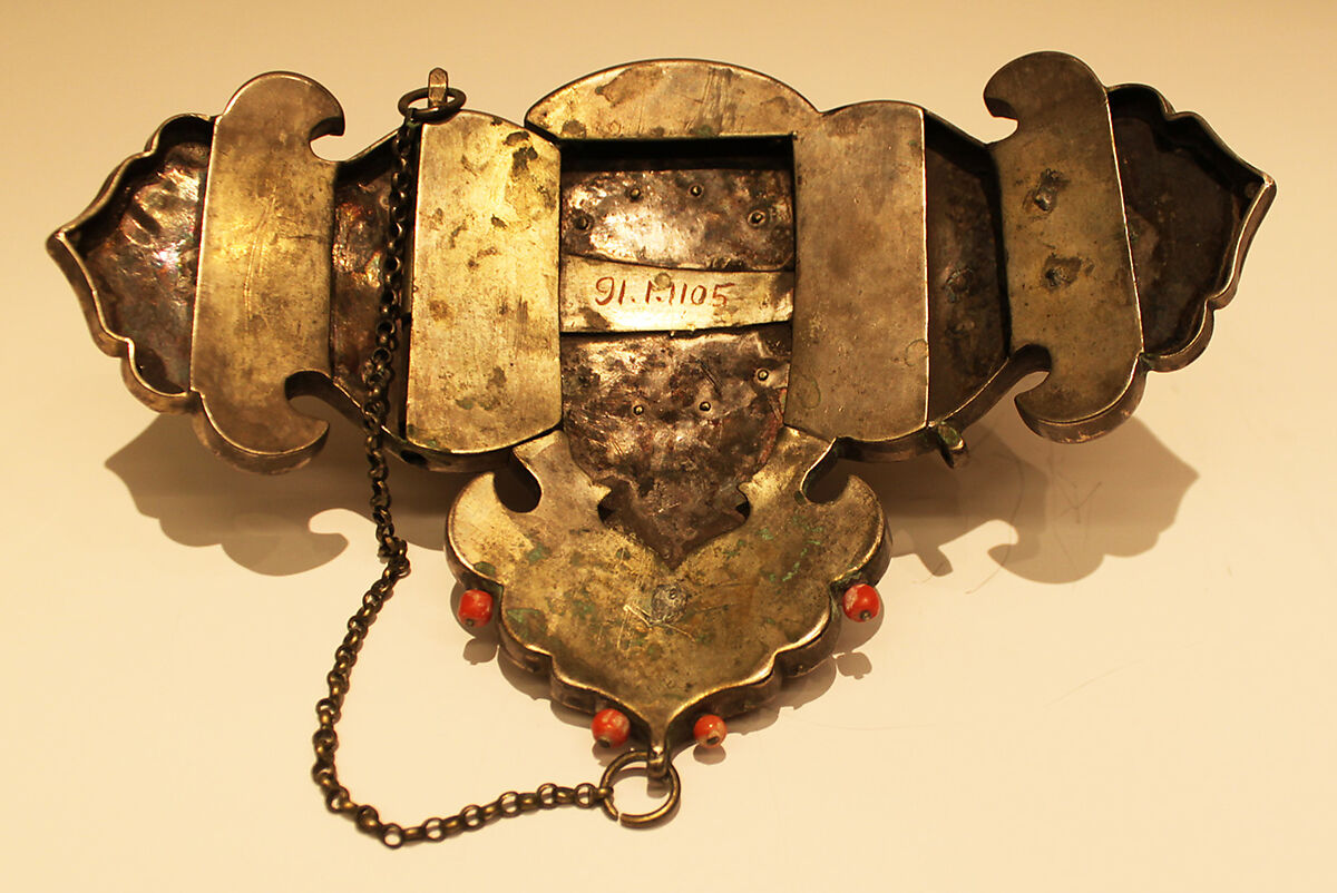 Girdle Clasp, Silver sheet; gilt, repoussé, patterned wire, and granulation; inlaid with silicae, coral and turquoise beads filigreed, granulation