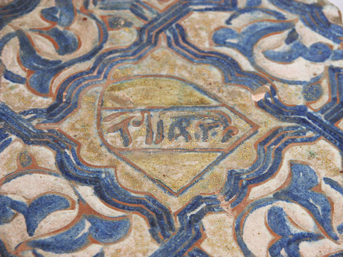 Tile, Earthenware; molded, cobalt-painted on an opaque white glaze powdered with gold under a transparent glaze