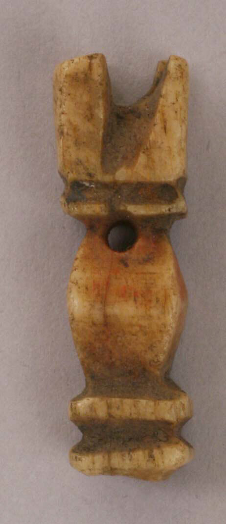 Pendant, Bone; carved and incised 