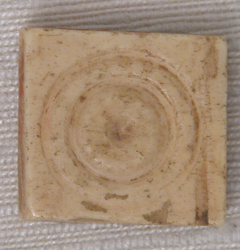 Counter, Bone; carved and incised