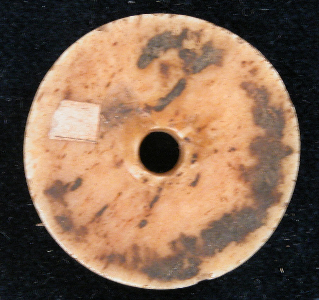 Button or Spindle Whorl, Bone; incised and inlaid with paint