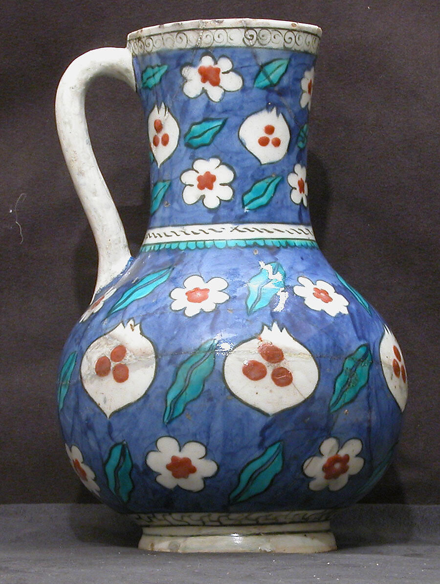 Blue-ground Ewer with Floral, Tiger-stripe and 'Cintamani' Designs, Earthenware; polychrome painted under transparent glaze 