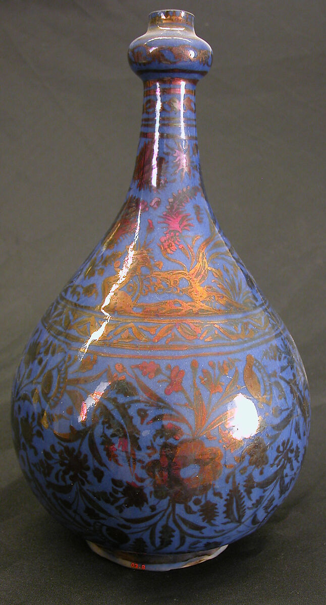 Bottle, Stonepaste; luster-painted on opaque blue glaze under transparent colorless glaze