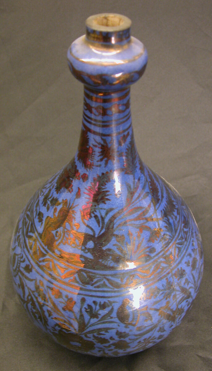 Bottle, Stonepaste; luster-painted on opaque blue glaze under transparent colorless glaze