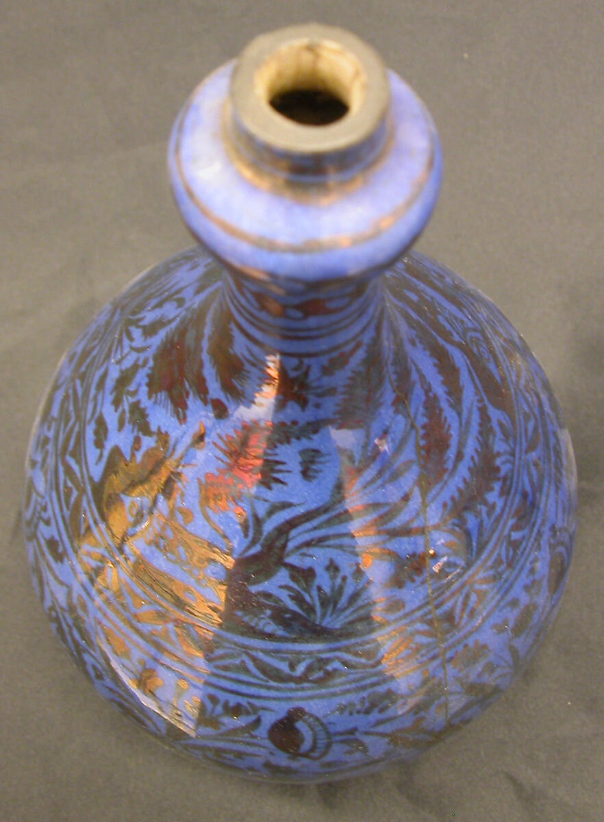 Bottle, Stonepaste; luster-painted on opaque blue glaze under transparent colorless glaze
