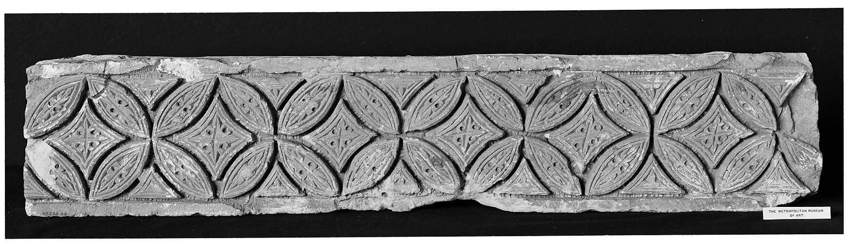 Fragment from a Post or Lintel with Leaves Branching from a Running Vine
