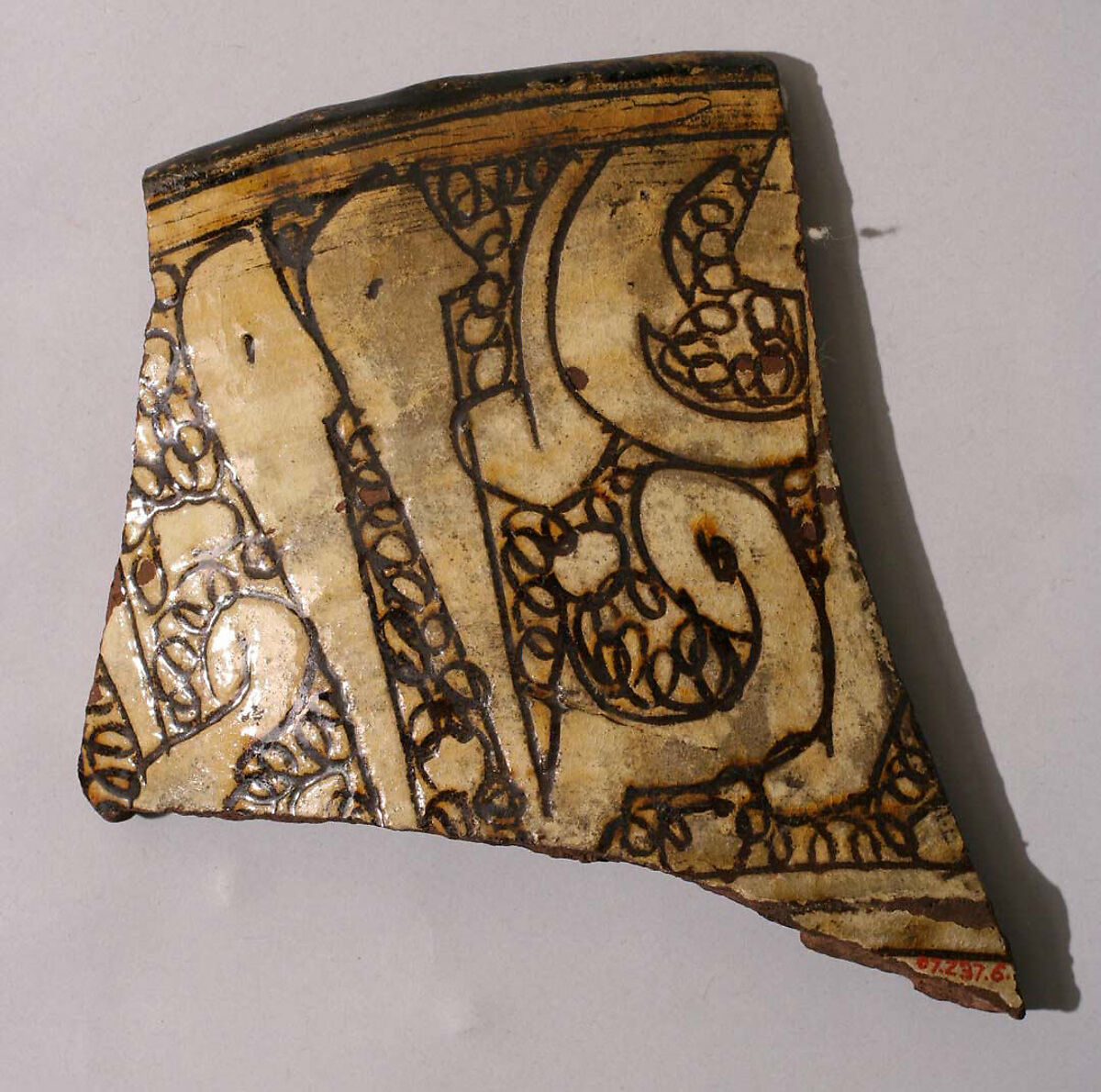 Fragment, Earthenware; incised decoration through a white slip and coloring under  transparent glaze 