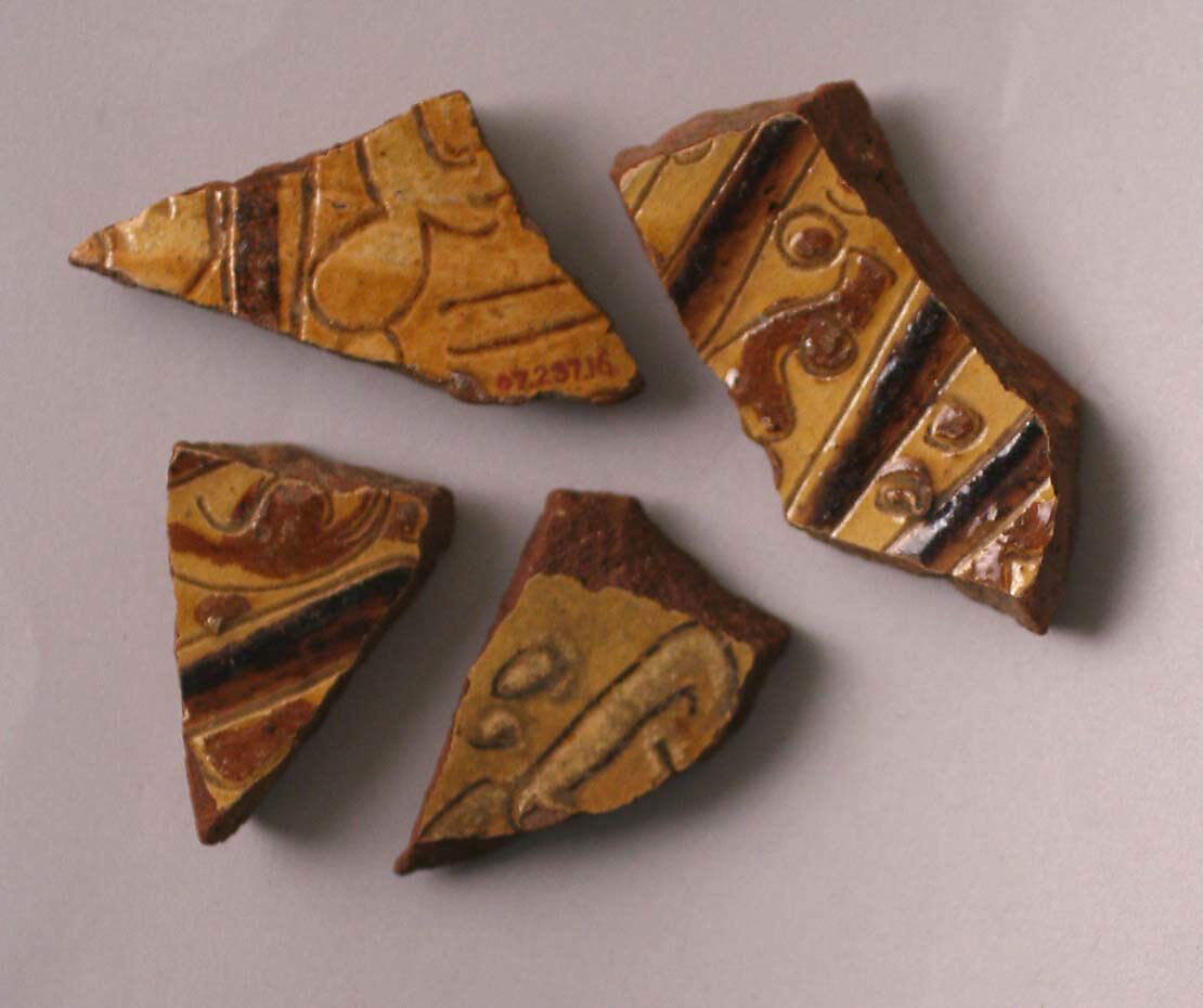 Fragments, Earthenware; incised decoration through a white slip and coloring under transparent glaze 