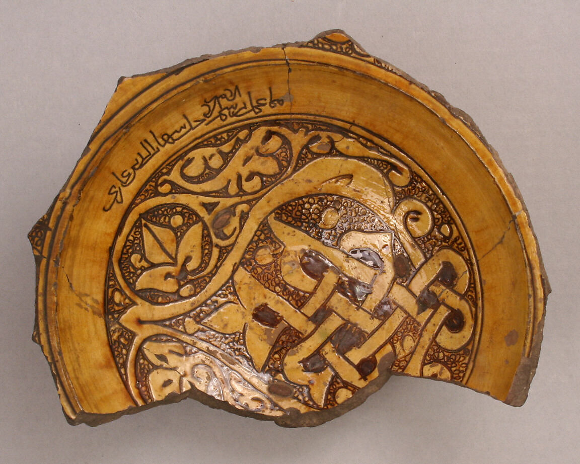 Fragment of a Bowl, Earthenware; incised decoration through white slip and coloring under transparent glaze 