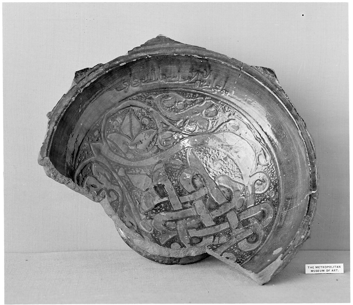 Fragment of a Bowl, Earthenware; incised decoration through white slip and coloring under transparent glaze