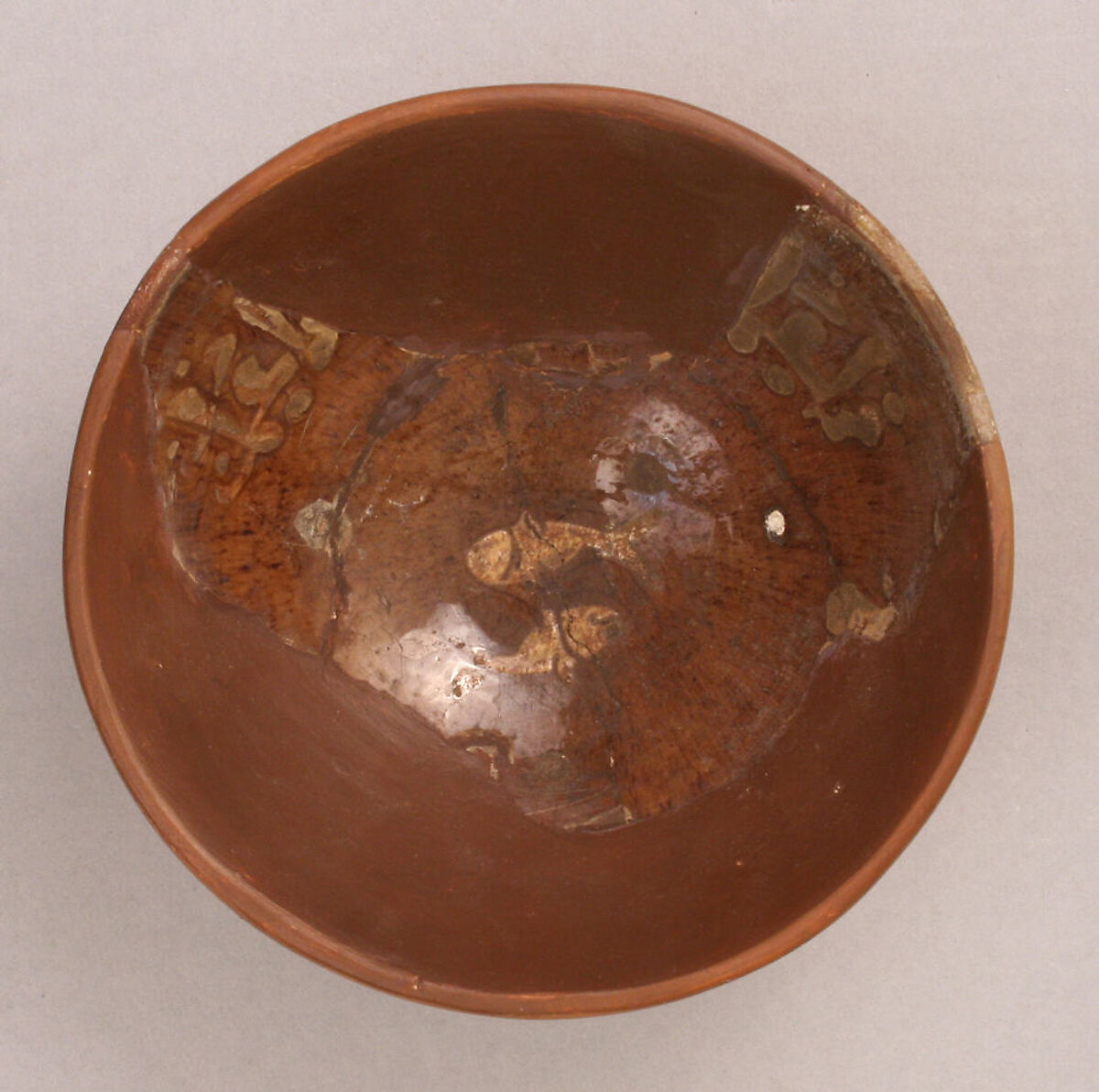 Fragment of a Bowl, Earthenware; incised decoration through a white slip and coloring under transparent glaze 