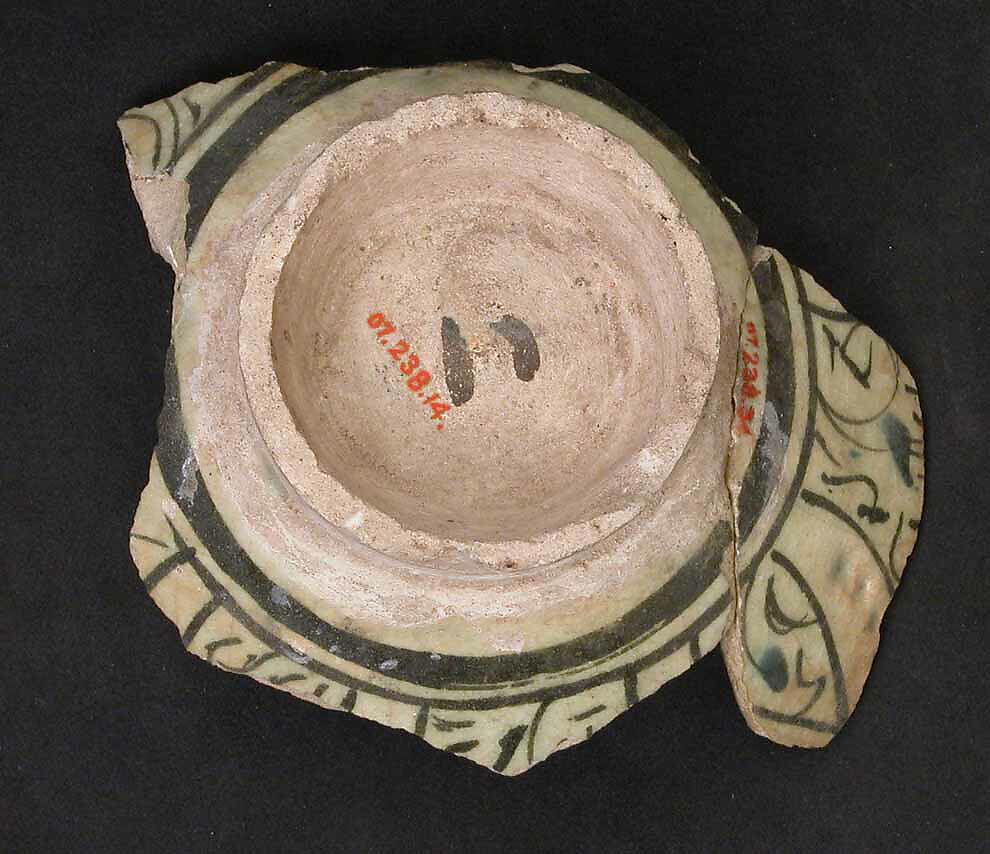 Fragment of a Bowl, Stonepaste; underglaze blue and black; transparent, colorless glaze