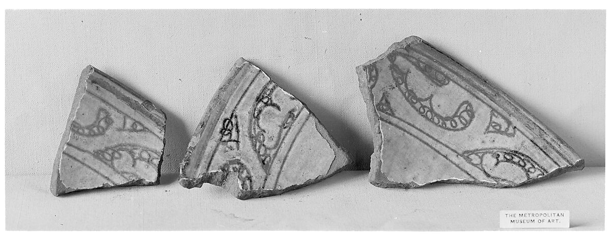 Fragment of a Bowl, Stonepaste; underglaze blue and black; transparent, colorless glaze