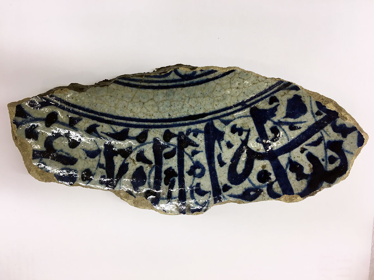 Fragment of a Bowl, Stonepaste; white slip; blue underglaze; transparent, colorless glaze 