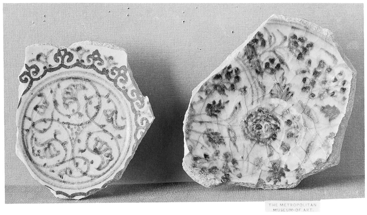 Fragment of a Bowl, Stonepaste; white slip; blue and black underglaze; transparent, colorless glaze