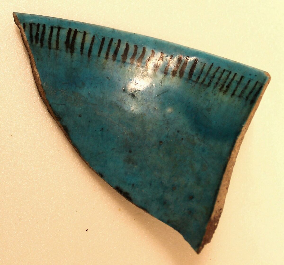 Fragment of a Cup, Stonepaste; underglaze painted under transparent turquoise glaze