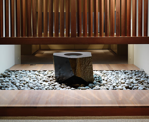Water Stone, Isamu Noguchi (American, Los Angeles, California 1904–1988 New York), Basalt; on a foundation bed of naturally rounded granite stones, Japan/United States