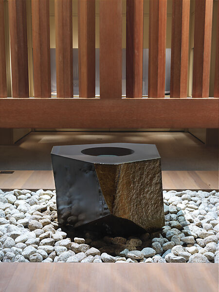Water Stone, Isamu Noguchi (American, Los Angeles, California 1904–1988 New York), Basalt; on a foundation bed of naturally rounded granite stones, Japan/United States