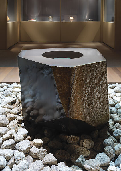 Water Stone, Isamu Noguchi (American, Los Angeles, California 1904–1988 New York), Basalt; on a foundation bed of naturally rounded granite stones, Japan/United States 