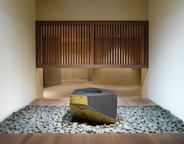 Water Stone, Isamu Noguchi (American, Los Angeles, California 1904–1988 New York), Basalt; on a foundation bed of naturally rounded granite stones, Japan/United States
