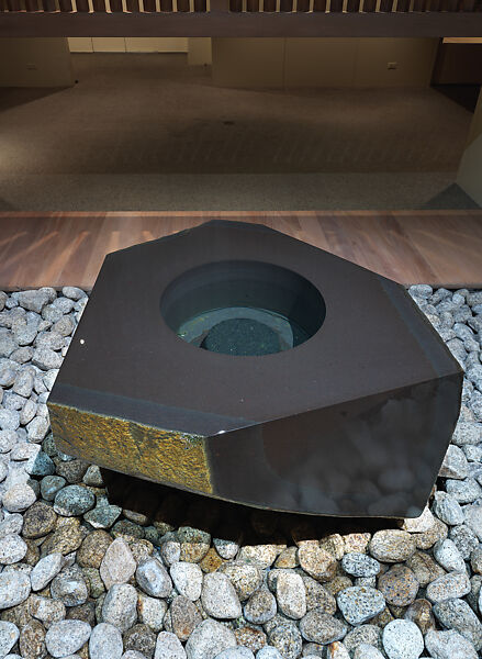 Water Stone, Isamu Noguchi (American, Los Angeles, California 1904–1988 New York), Basalt; on a foundation bed of naturally rounded granite stones, Japan/United States