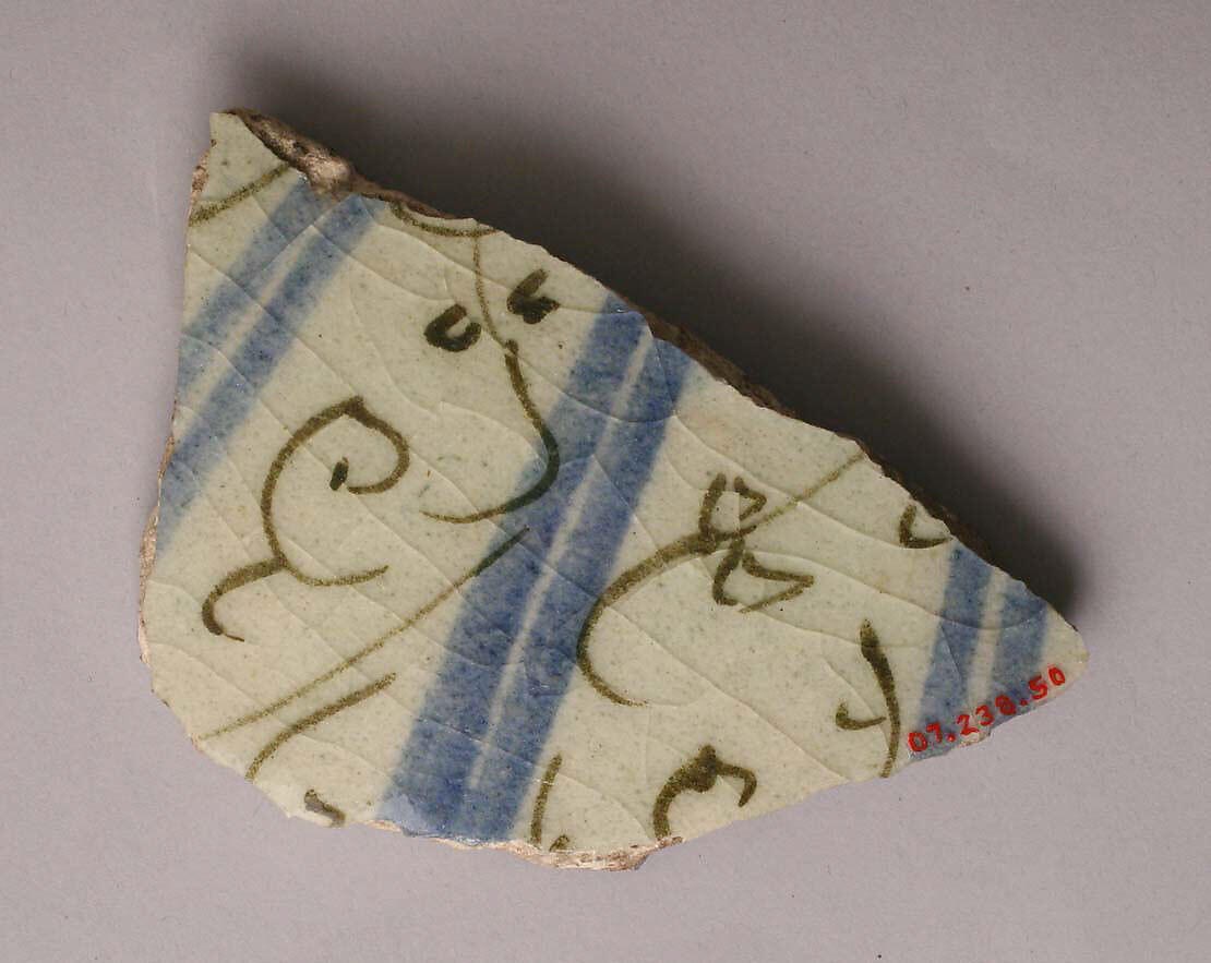 Ceramic Fragment, Stonepaste; white slip; blue and black underglaze; transparent, colorless glaze