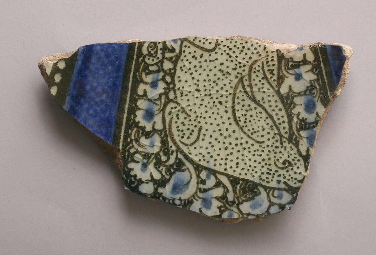 Fragment, Stonepaste; white slip; blue and black underglaze; transparent, colorless glaze 