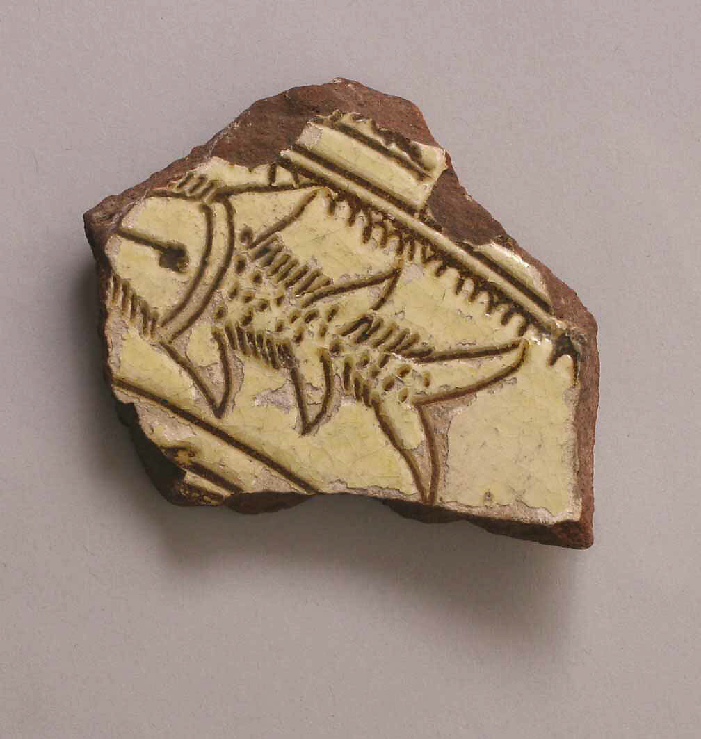 Fragment, Earthenware; incised decoration through a white slip and coloring under transparent glaze 