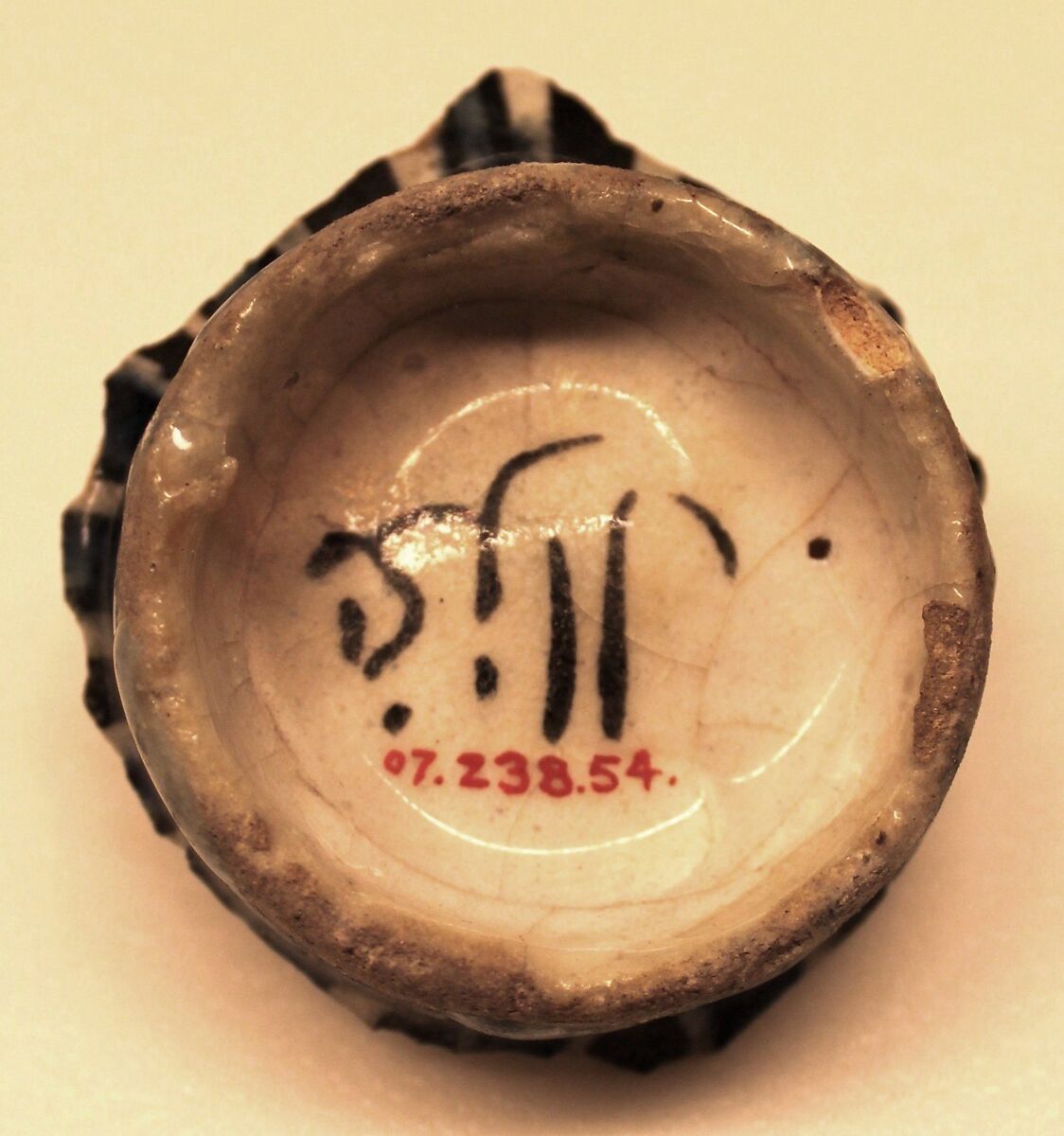 Fragment of a Bowl, Stonepaste; polychrome painted under transparent glaze