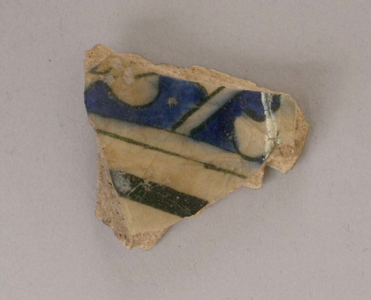 Fragment, Stonepaste; white slip; blue and black underglaze; transparent, colorless glaze 