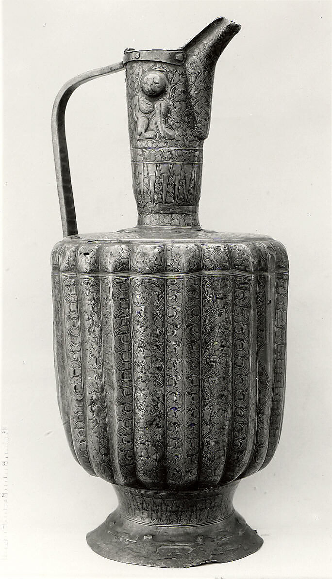 Ewer, Brass; fluted, engraved and repoussé, originally inlaid with silver