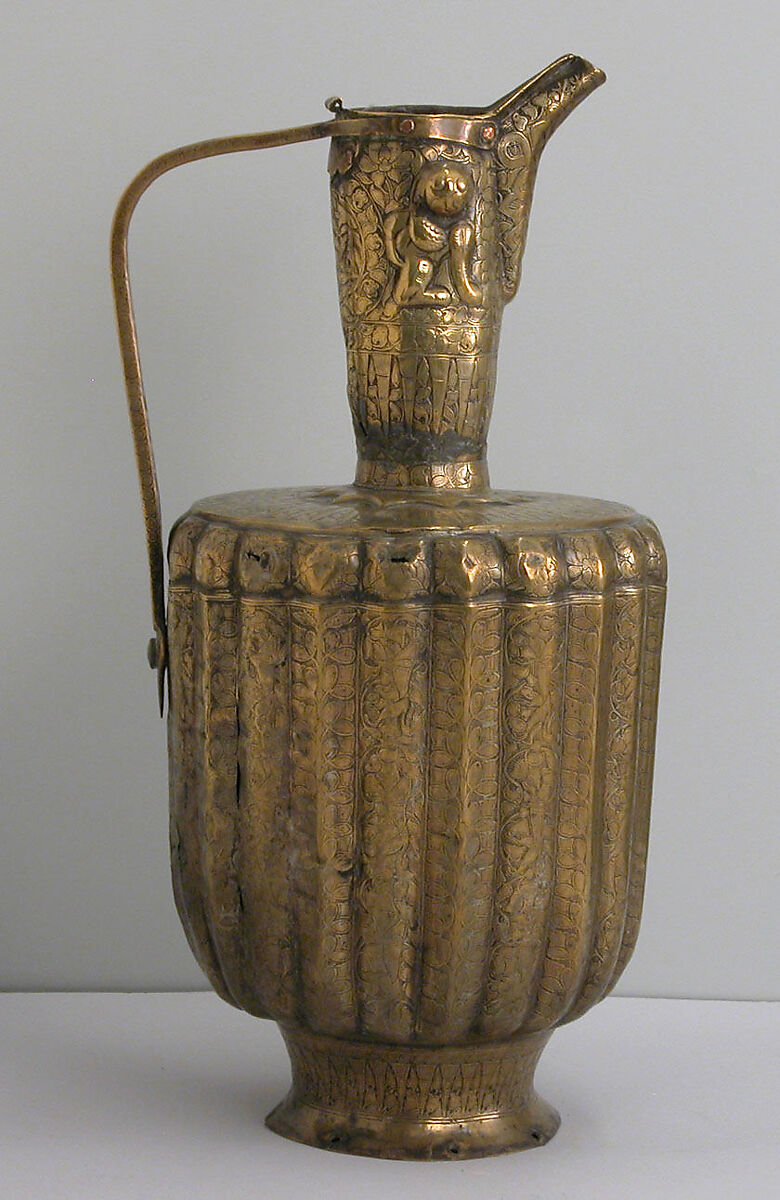 Ewer, Brass; fluted, engraved and repoussé, originally inlaid with silver 