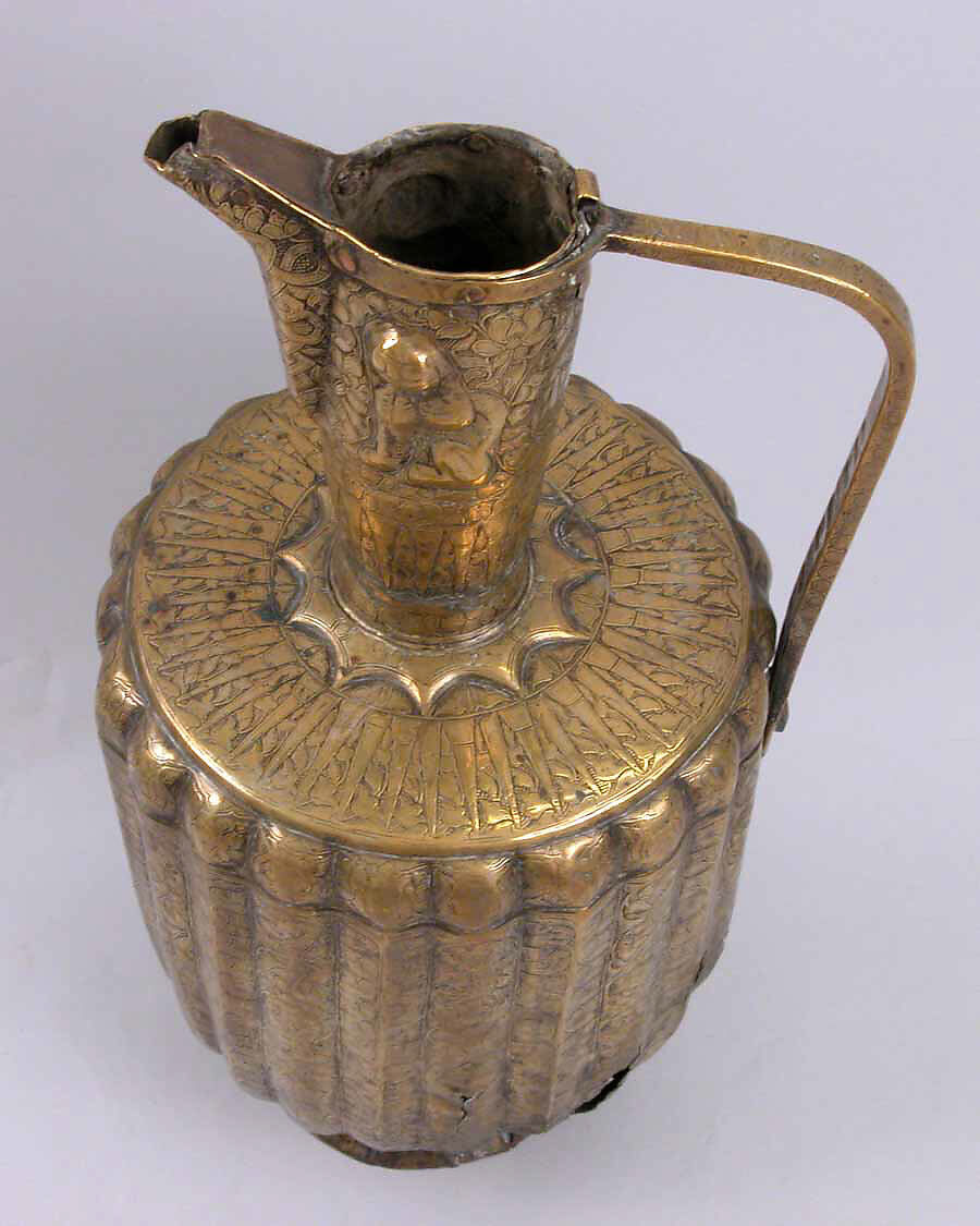 Ewer, Brass; fluted, engraved and repoussé, originally inlaid with silver