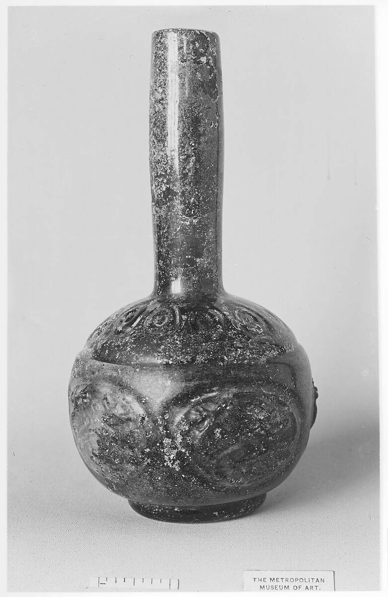 Bottle with Molded Designs of Animals, Glass; blown in two parts, impressed with tongs