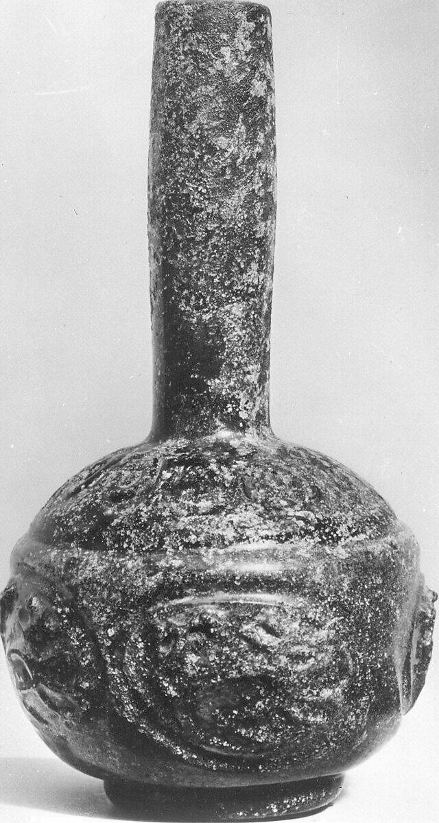 Bottle with Molded Designs of Animals, Glass; blown in two parts, impressed with tongs